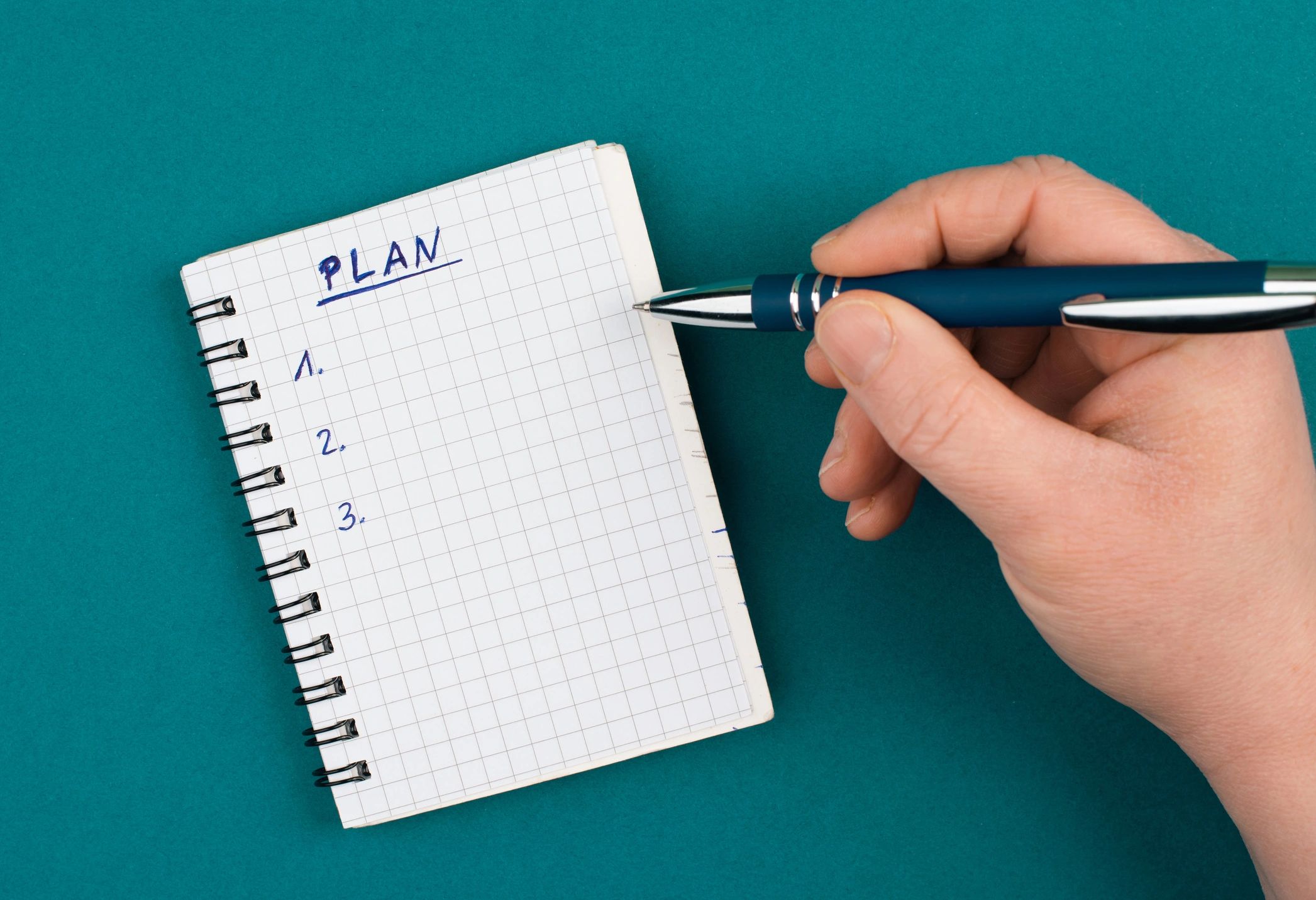 Notebook with plan written on the page