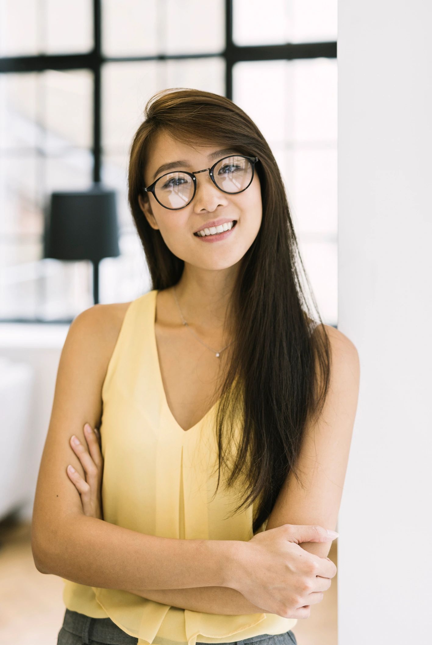 Smiling woman representing the founder of The Mindset Key